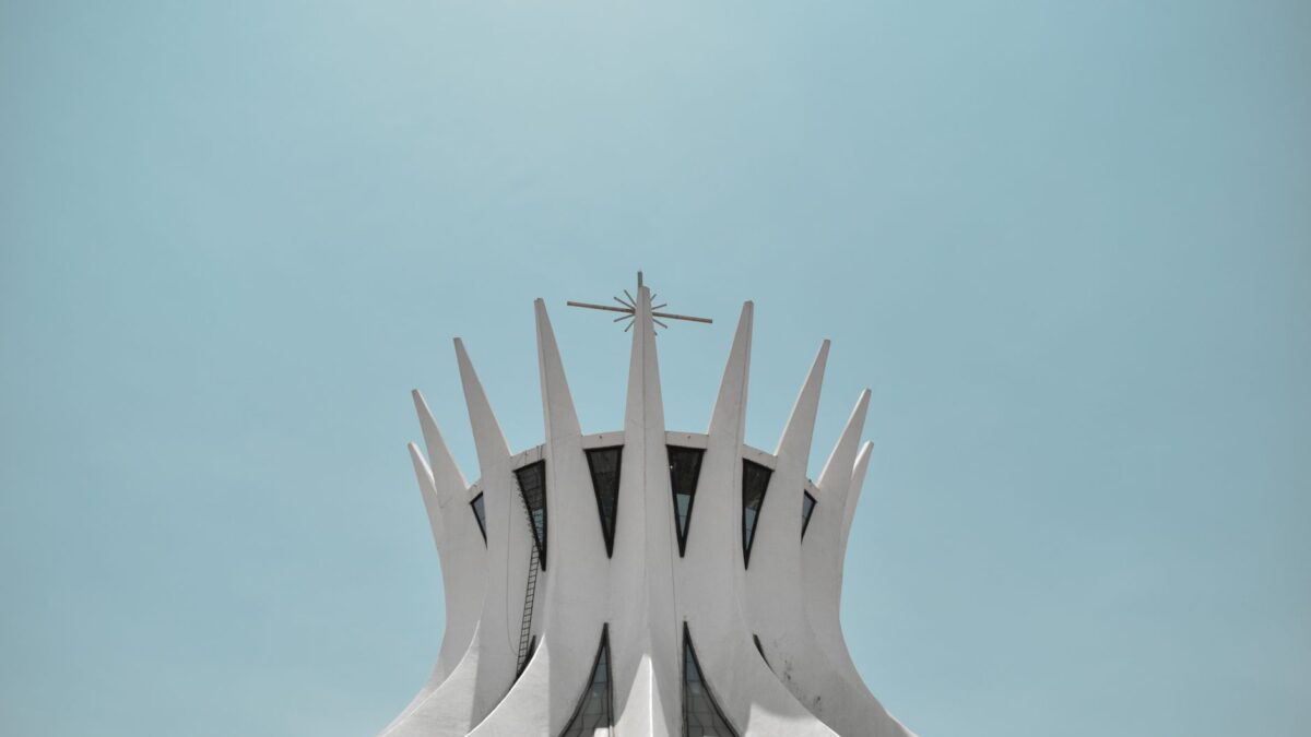Stunning view of the Cathedral of Brasília against a clear blue sky, showcasing its modern design.