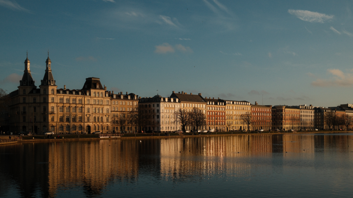 Beautiful waterfront view of colorful historic buildings in Copenhagen, Denmark.
