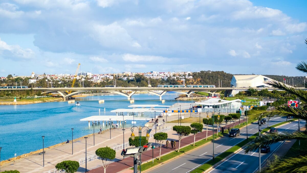 Scenic view of Rabat's waterfront showcasing modern bridge architecture and blue skies.