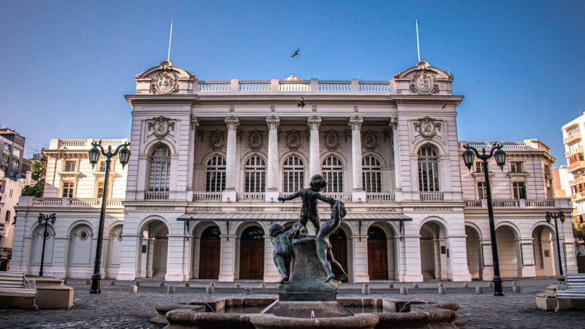 Elegant view of the historic Municipal Theatre in Santiago, Chile with a central fountain.