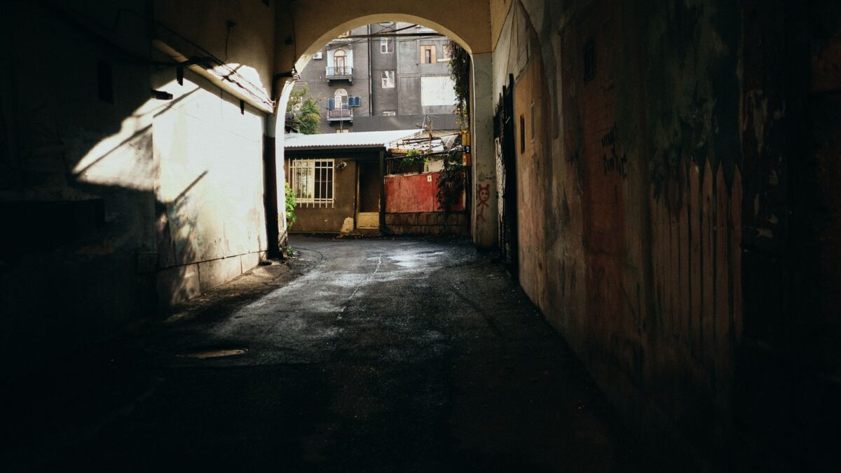 Captivating moody alleyway in Yerevan, Armenia with dramatic light and shadow play.